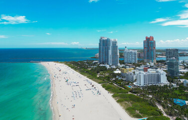 Aerial view of Miami skyline. Drone shot of Miami cityscape. Top view of South Miami and the ocean. Miami skyline with skyscrapers and coastline from above.