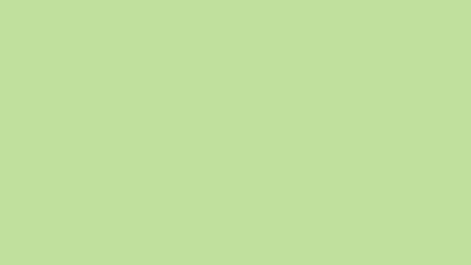 Light, pale, yellowish-green solid color background