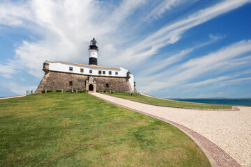 Historic lighthouse at Barra Salvador Bahia with scenic sky and ocean view