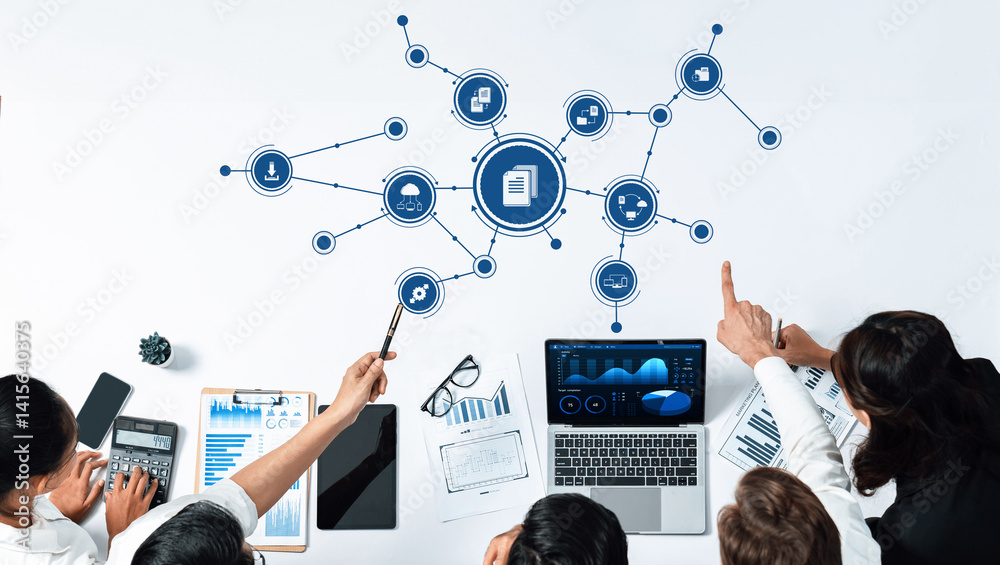 Poster A dynamic group of professionals collaborate on a data management project, utilizing technology for strategic planning, visualization, and insights sharing in a modern office setting. Amity
