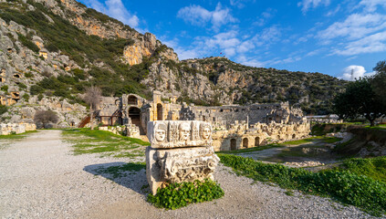 Fototapeta premium Ruins Myra Ancient City in Demre to Antalya, archaeology landmarks of Turkey. Remains of theatre in Myra, Greco-Roman ancient city in Antalya, Turkey.