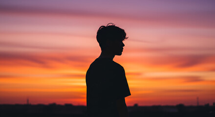 Silhouette of person against sunset with sky 