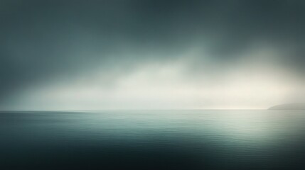 Obraz premium Misty, somber seascape of a muted horizon.