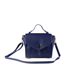 Blue fashion purse handbag on white background isolated