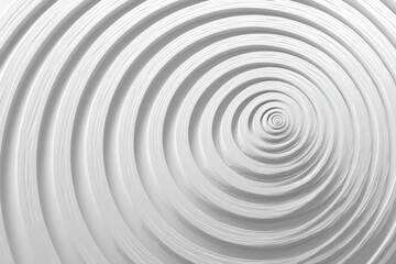 Fototapeta premium A mesmerizing abstract pattern of concentric white circles receding into the center creating an optical illusion of depth and dimension.