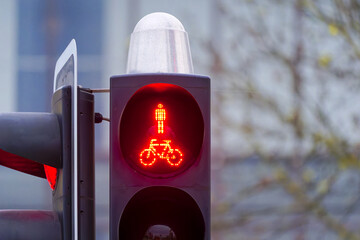 Close-up of red light of traffic light with symbol of pedestrian and bicycle at Swiss City of...