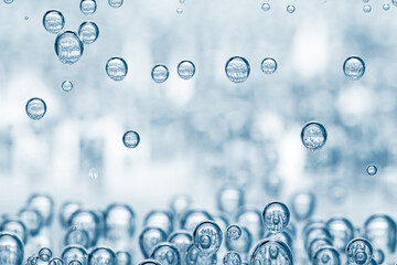 Soda water with bubbles in glass, closeup