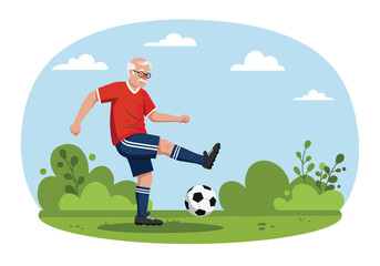 Active senior man playing soccer outdoors on a field. Healthy lifestyle and sport in old age concept