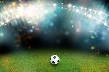 Soccer ball on green grass at stadium. Football game