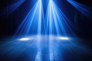 Obraz premium Two blue spotlights illuminate a dark wooden floor, creating a dramatic and mysterious atmosphere.