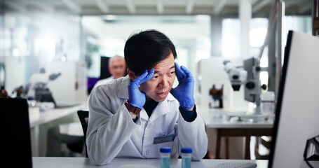 Man, scientist or computer in laboratory for mistake or scientific error or research fail. Person, science or frustrated with headache or stress for bad experiment, chemistry trial or medical results
