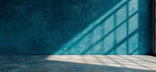 Obraz premium Empty room with teal walls and sunlight