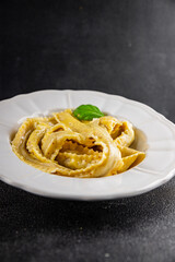 Pappardelle pasta filling main course appetizer vegetables dish fresh delicious gourmet food background on the table rustic food top view copy space  vegetarian and vegan food