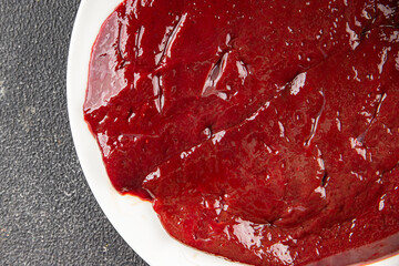 Raw liver beef veal meat steak liver grill appetizer vegetables dish fresh delicious gourmet food background on the table rustic food top view copy space keto and paleo diet