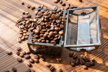 Coffee beans in glass treasure chest close up