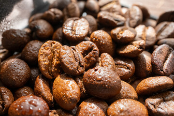 Coffee beans in glass treasure chest close up