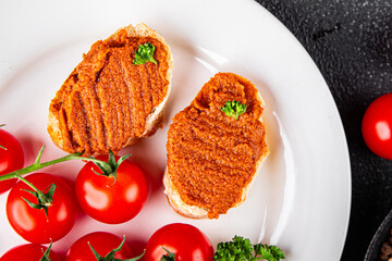 Pepper pate red pepper vegetarian dip roasted vegetable hummus appetizer vegetables dish fresh gourmet food background on table rustic food top view copy space keto and paleo diet vegan food