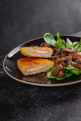 Cordon Bleu Cutlet meat chicken, ham, cheese appetizer dish fresh delicious gourmet food background on the table rustic food top view copy space