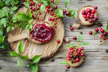 Homemade Cranberry Gooseberry Jam Spread on Rustic Bread Slice