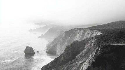  Cliffs and sea stacks in foggy coastal landscape
