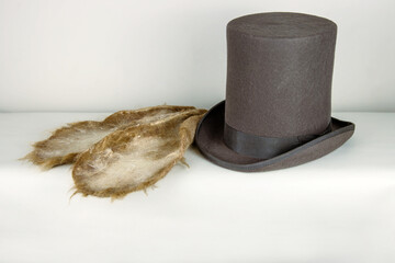 Felted  ears on a top hat.  White rabbit or march hare hat. Bunny ears attached to the top hat on...