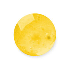 Drop of golden serum on white background