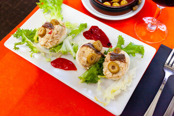 Deviled eggs with olives. Stuffed egg halves, appetizer