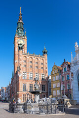 Neptune Fountain (Fontanna Neptuna) in front of Old Town City Hall at Long Market Dlugi Rynek in old town city center, Gdansk, Poland. © GISTEL