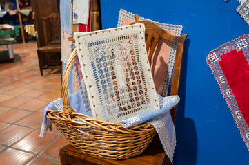 Traditional canarian handmade cotton lace in mountain village shop, Garachico, Tenerife, Spain