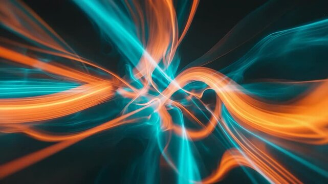 Abstract long exposure videograph displaying vibrant light trails in orange, blue, and teal hues against a dark background