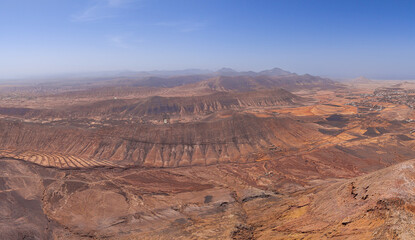 Dramatic aerial image of Montana Escanfraga and the volcanic mountain landscape and coastline near Villaverde in Fuerteventura Canary Islands Spain	