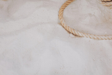 Intricate details of natural fibers and sandy textures create a soothing atmosphere at the coastal...