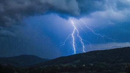 Towering dark clouds and bright lightning