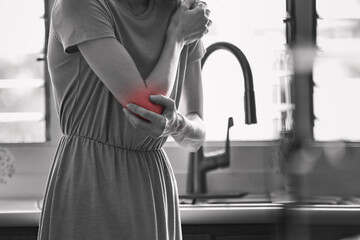 Person with elbow joint pain 