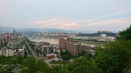 Obraz premium Elevated perspective of urban landscape lining the Jialing River