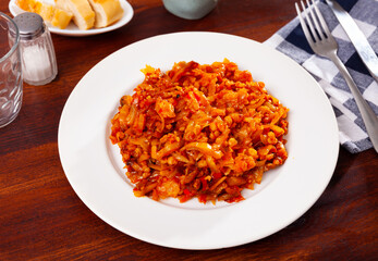 Vegetarian dish - barley with stewed cabbage