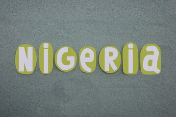 Nigeria, officially the Federal Republic of Nigeria, country in West Africa, creative logo composed with green painted stone letters over green sand