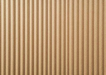 Obraz premium Close-up view of textured corrugated cardboard showcasing vertical ridges and grooves. ideal for packaging design or crafting projects. with a neutral background