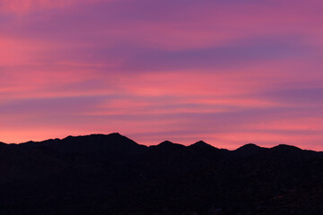 Sunrise sunset mountain silhouette pink purple background