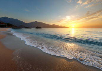Fototapeta premium a stunning beach at sunset, with golden sand and calm waters, perfect for summer vacation