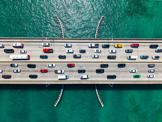Top aerial view of the causeway. Key Biscayne bridge. Draw bridge with cars passing. Broad Causeway Bridge spans Biscayne Bay. Connecting town of Bay Harbor Islands to mainland Miami