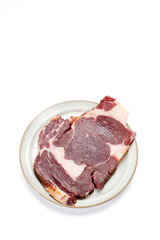Steak and lamb chops, fresh grilled meat, solid white background