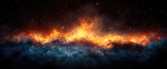 Fototapeta premium A vibrant fiery galaxy bursts with shades of gold and blue, speckled with stars in the night sky