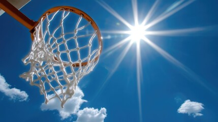 Basketball hoop under a bright sunny sky