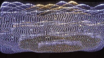Opulent Crystal Chandelier with Geometric Patterns and Sparkly Elements