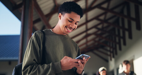 Phone, education and typing with boy at school for University application, news and communication app. College admissions, learning portal and future with student on campus for mobile and scholarship