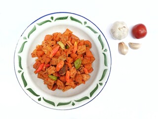 Stir-fried spicy potatoes, liver and stink beans in plate with white background