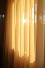 Soft morning sunlight filtering through sheer curtains, creating a warm ambiance in a cozy room