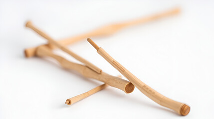 Natural toothbrush Miswak (Kayu Sugi) on white background with selective focus. It is a teeth cleaning twig made from the Salvadora persica tree and also know as miswaak, siwak, Sugi or sewak