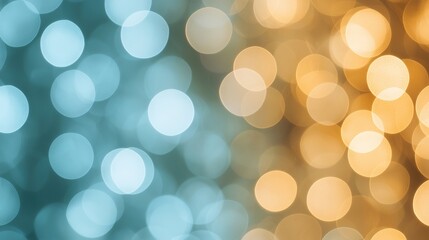 Obraz premium A vibrant image showcasing blurred blue and golden bokeh lights, creating a dreamy, festive atmosphere.
